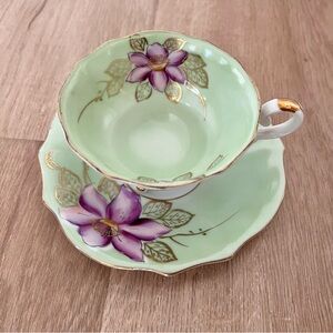 Vtg Collectible Fluorescent Gilt‎ Trim 3-Footed Tea Cup & Saucer Purple Flower